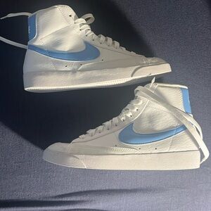 White and blue Nike blazers. Never wore outside. Too narrow for my feet